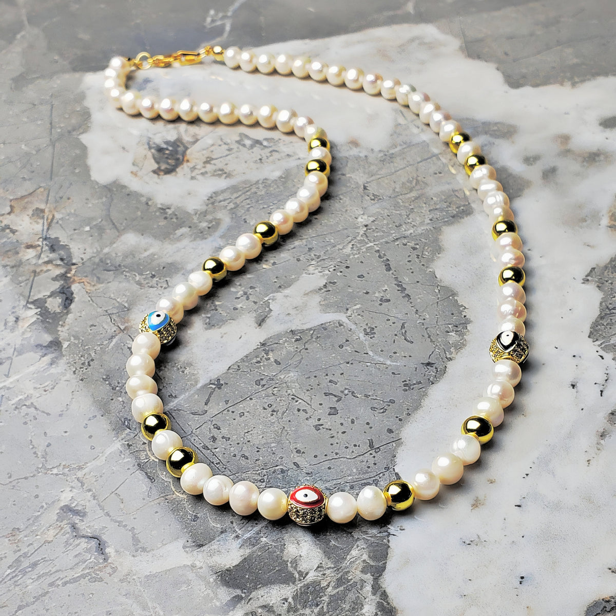 Collana con occhio turco pavé e perle